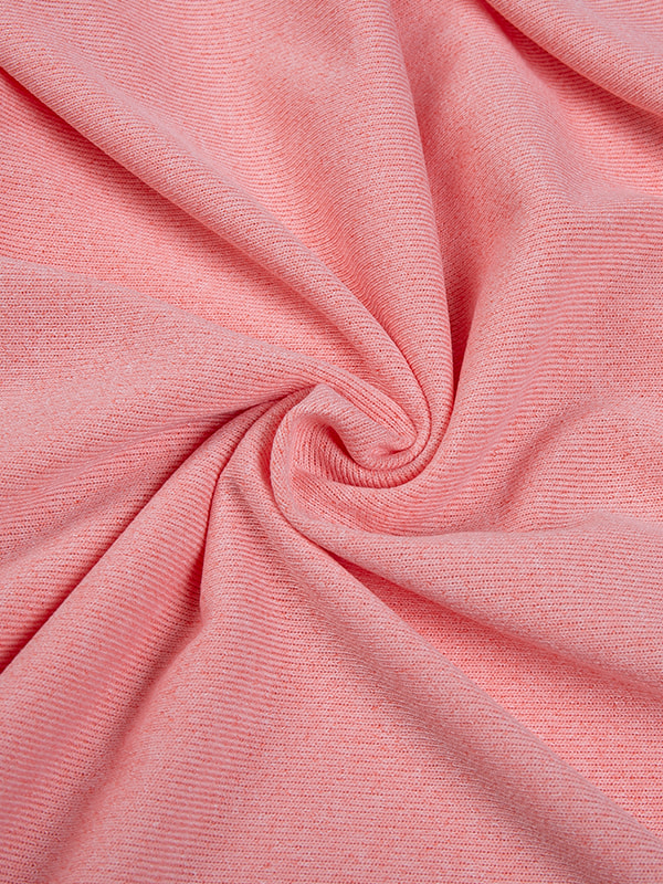 What are the key advantages of Polyester Spandex Loose Knit Fabric's plasticity in garment manufacturing?