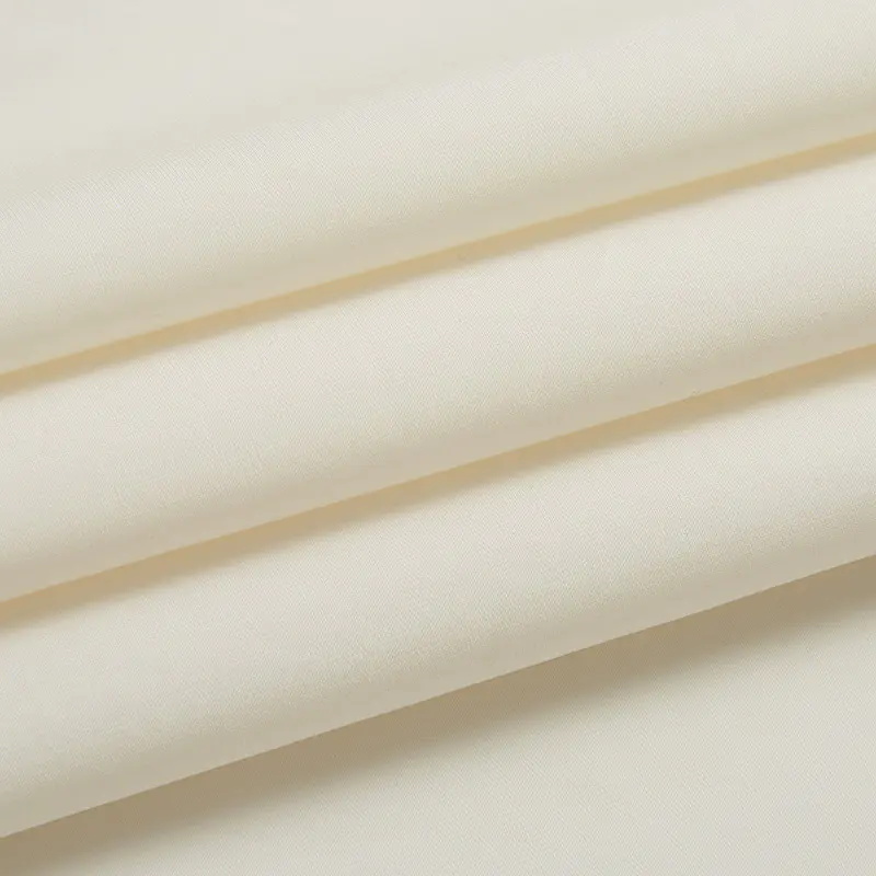 What are the characteristics of cotton poplin fabric